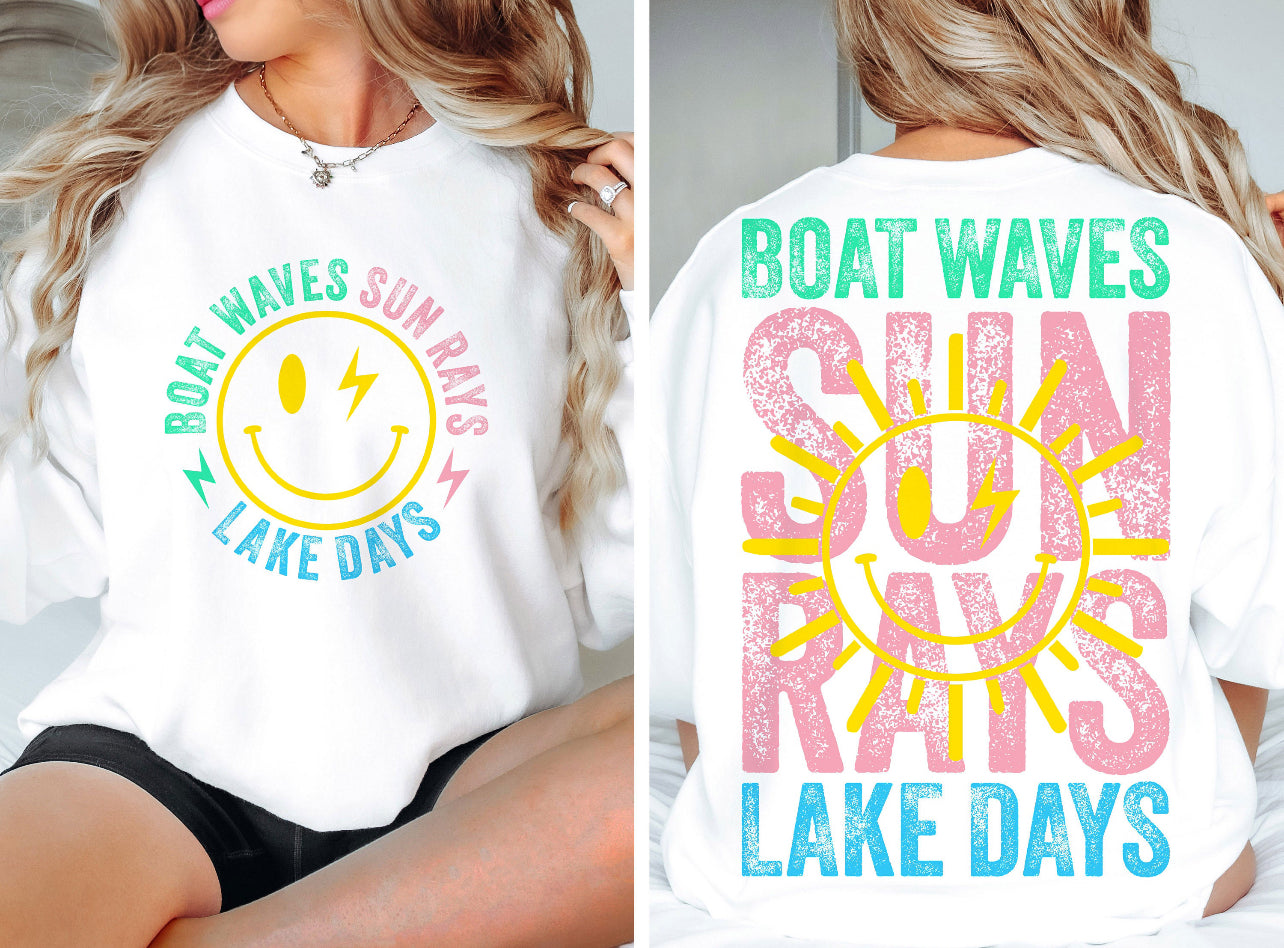 Sun rays boat waves graphic t-shirt