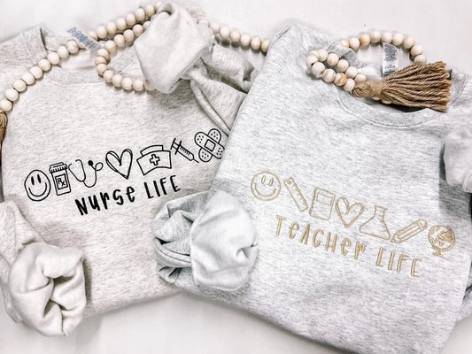Teacher life icon embroidered crewneck