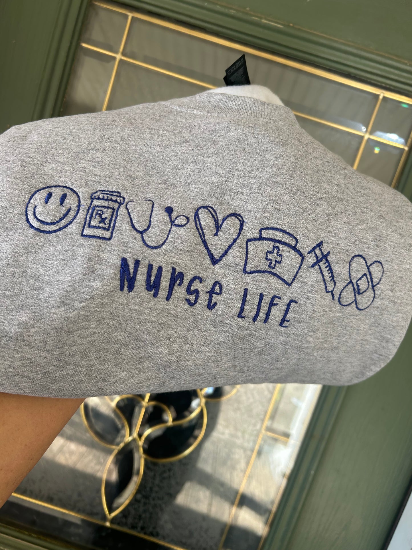 Teacher life icon embroidered t-shirt