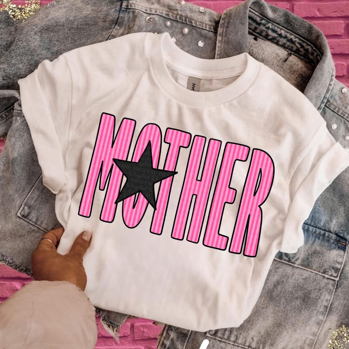 White Comfort Colors T-shirt with pink striped MOTHER lettering and black star